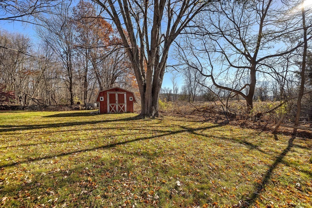 138 Coy Hill Road Warren, MA 01083 - Photo 2 of 42 a house view with a trees