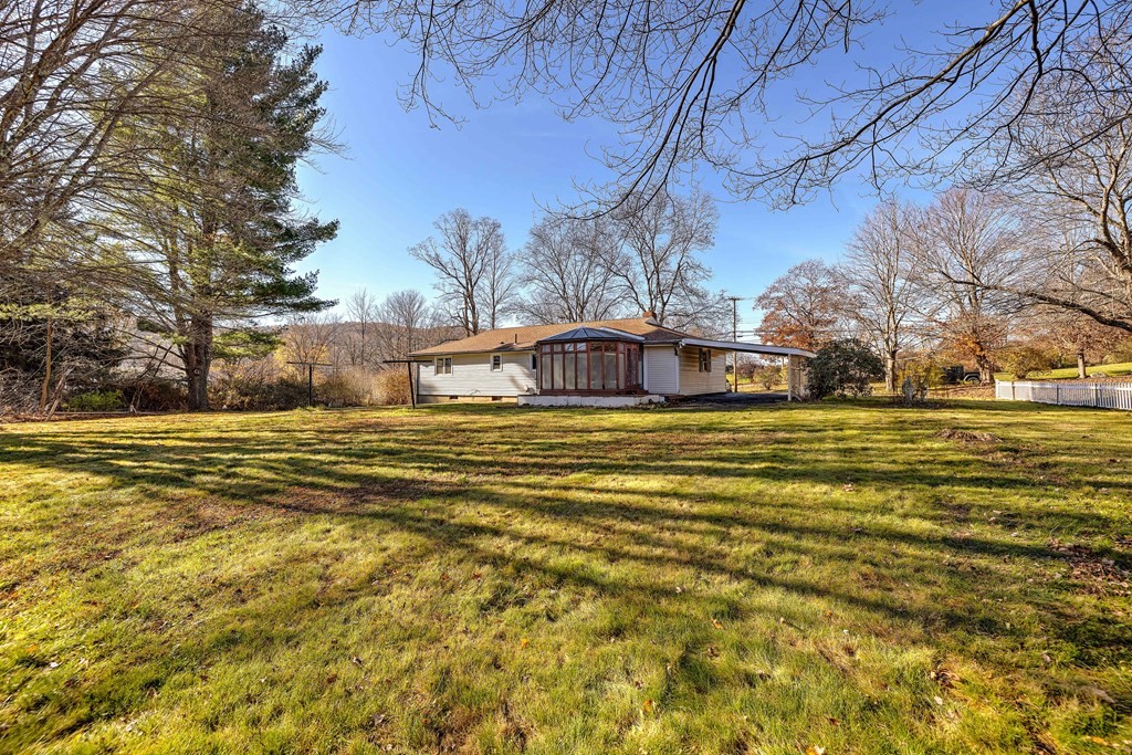 138 Coy Hill Road Warren, MA 01083 - Photo 33 of 42 a view of a lake with houses