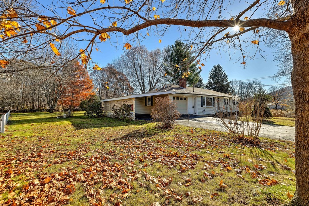 138 Coy Hill Road Warren, MA 01083 - Photo 35 of 42 a house view with a backyard space