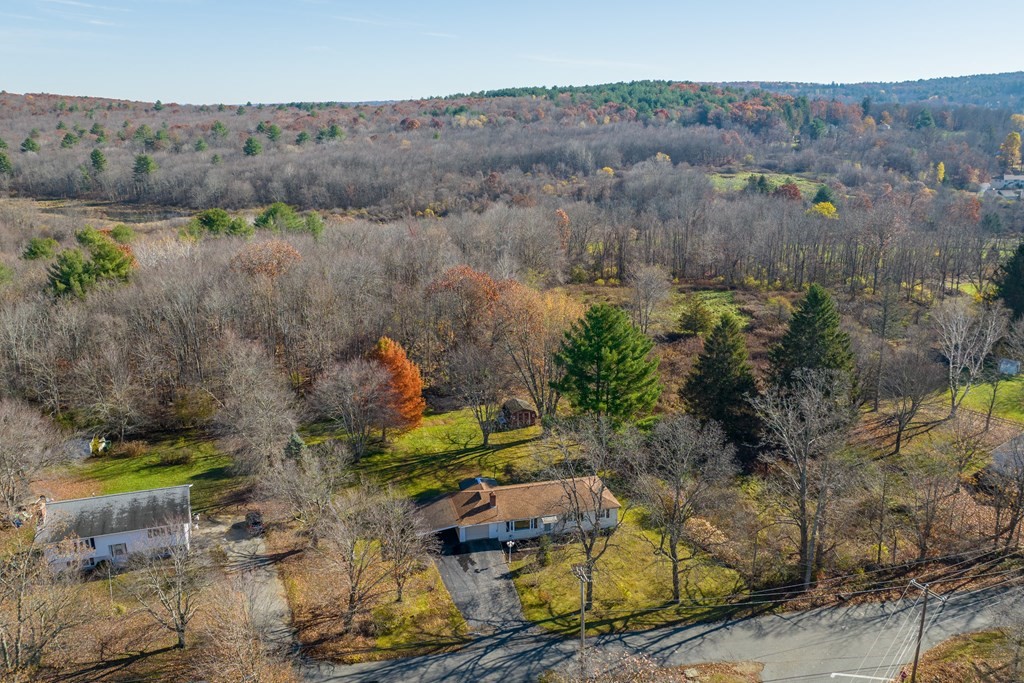 138 Coy Hill Road Warren, MA 01083 - Photo 38 of 42 an aerial view of a house with a yard