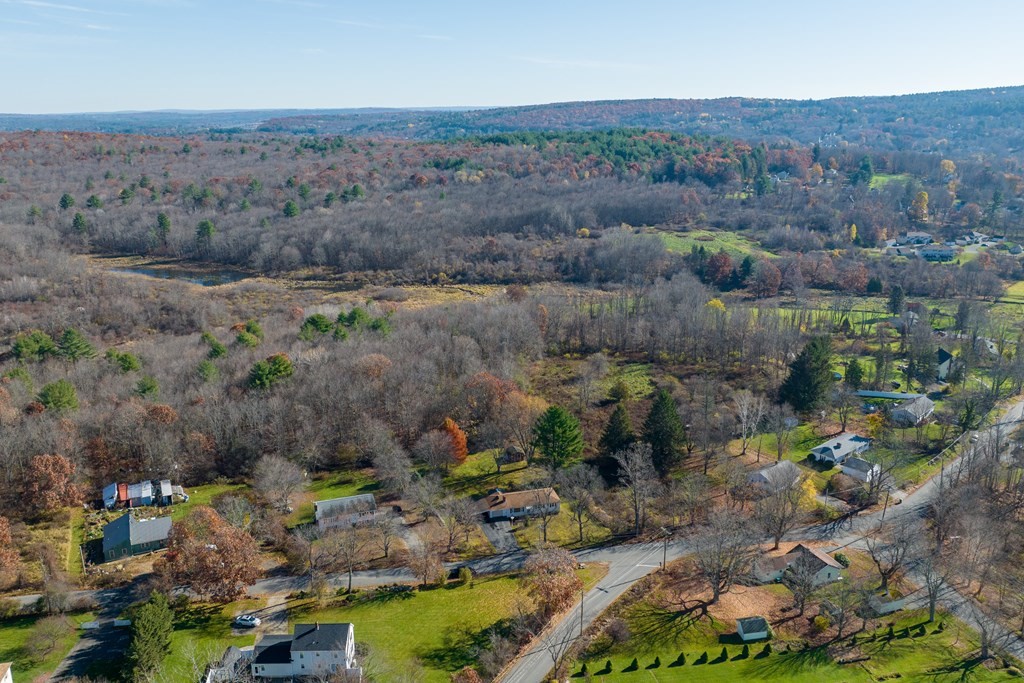 138 Coy Hill Road Warren, MA 01083 - Photo 39 of 42 an aerial view of green landscape with trees