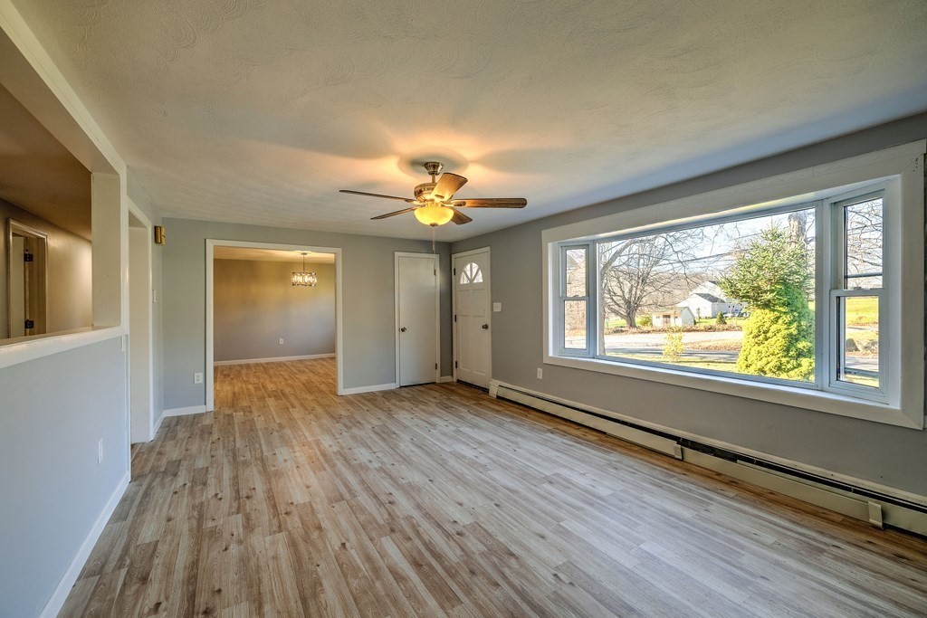 138 Coy Hill Road Warren, MA 01083 - Photo 5 of 42 wooden floor in an empty room with a window