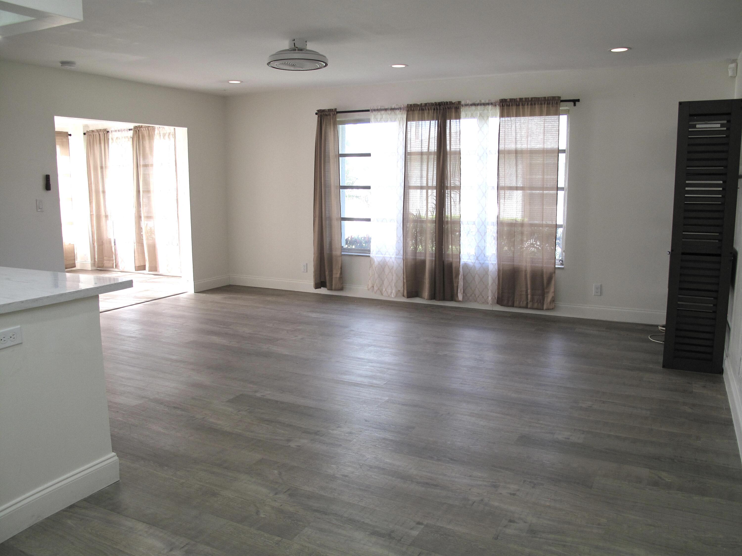 1217 South Drive Way, Unit A Delray Beach, FL 33445 - Photo 13 of 48 Living room view (1)