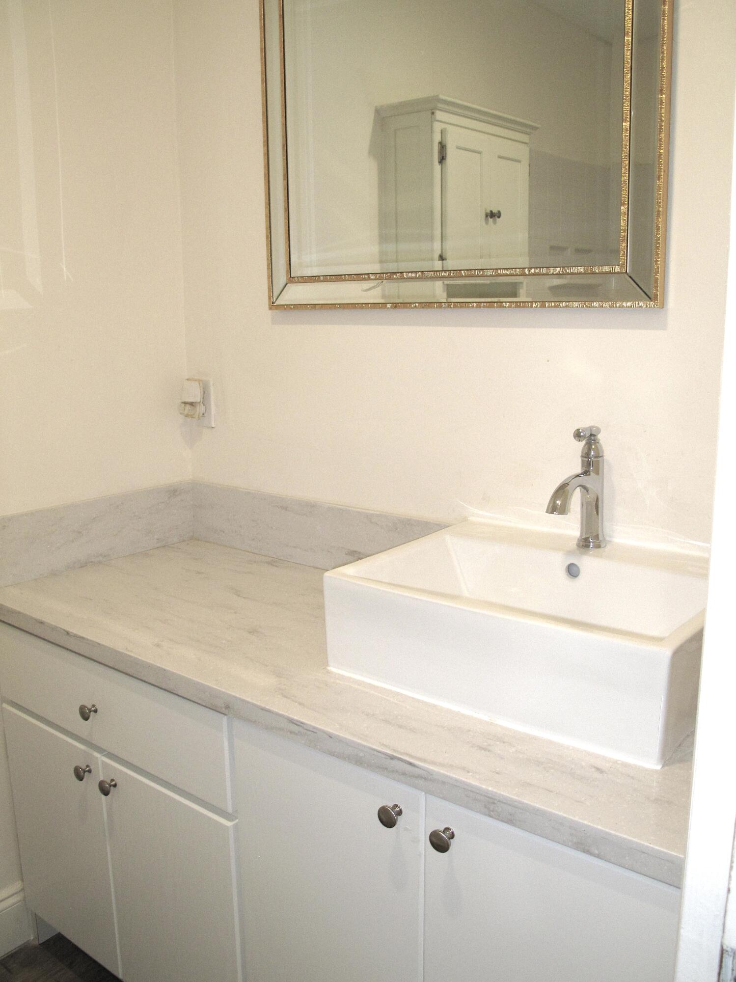 1217 South Drive Way, Unit A Delray Beach, FL 33445 - Photo 20 of 48 Updated guest bathroom (2)