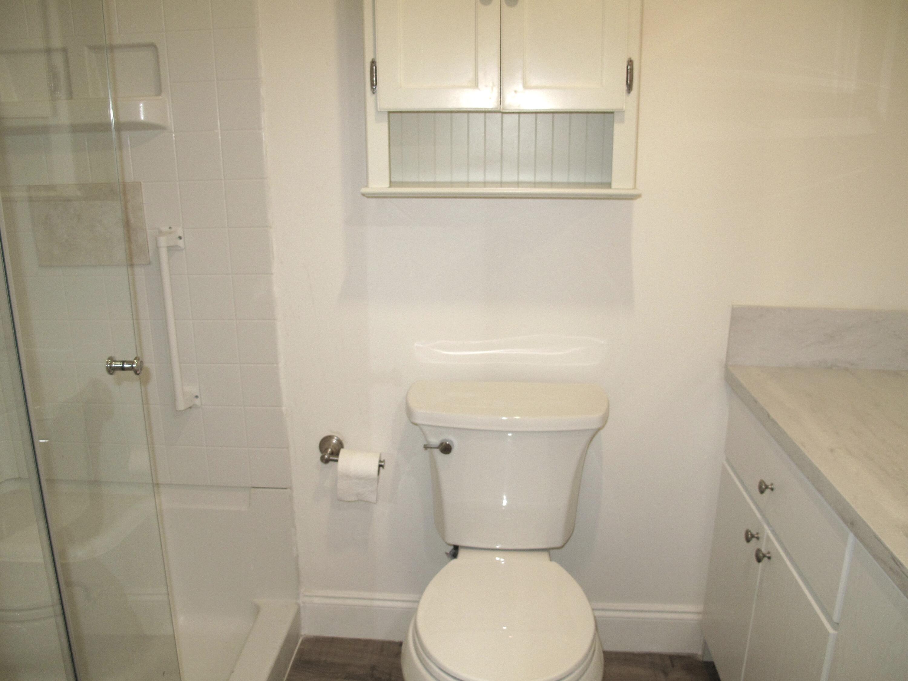 1217 South Drive Way, Unit A Delray Beach, FL 33445 - Photo 21 of 48 Updated guest bathroom (3)