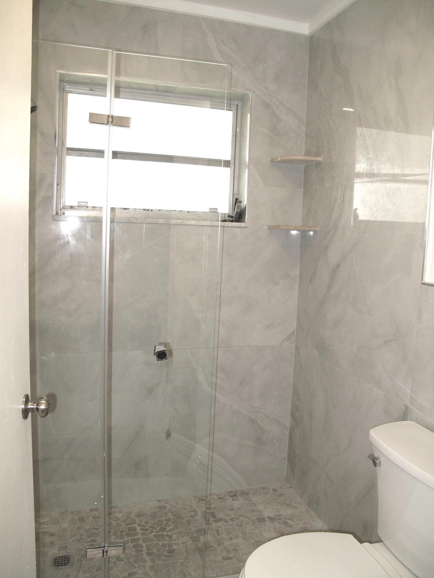 1217 South Drive Way, Unit A Delray Beach, FL 33445 - Photo 24 of 48 Master bathroom (1)