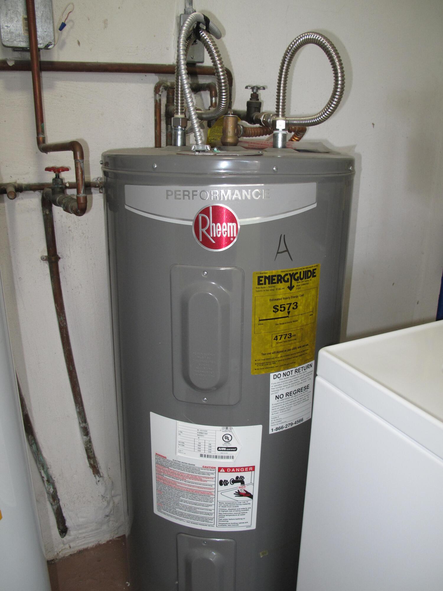 1217 South Drive Way, Unit A Delray Beach, FL 33445 - Photo 35 of 48 water tank 2014
