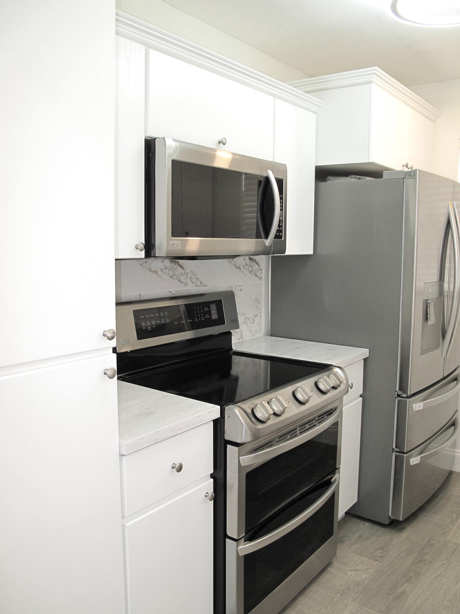 1217 South Drive Way, Unit A Delray Beach, FL 33445 - Photo 5 of 48 Open Concept Kitchen (5)