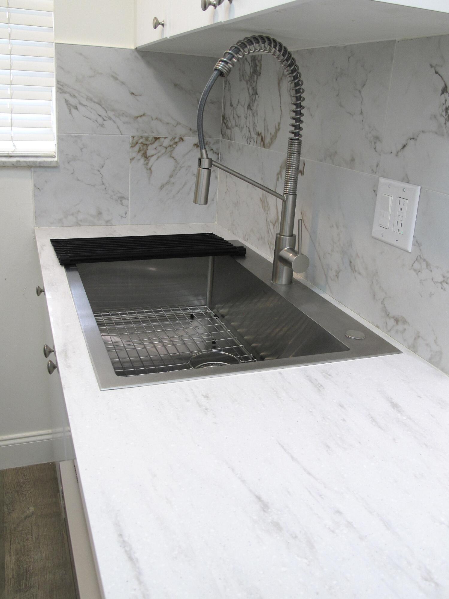 1217 South Drive Way, Unit A Delray Beach, FL 33445 - Photo 8 of 48 Large SS sink with gooseneck faucet