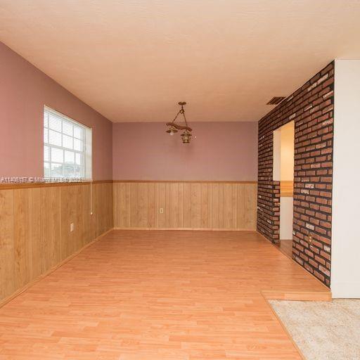 10391 Southwest 156th Street Miami, FL 33157 - Photo 17 of 33 an empty room with windows