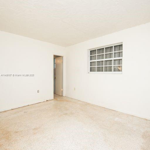 10391 Southwest 156th Street Miami, FL 33157 - Photo 24 of 33 an empty room with windows