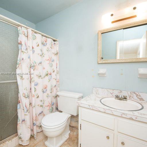 10391 Southwest 156th Street Miami, FL 33157 - Photo 25 of 33 a bathroom with a sink toilet and shower