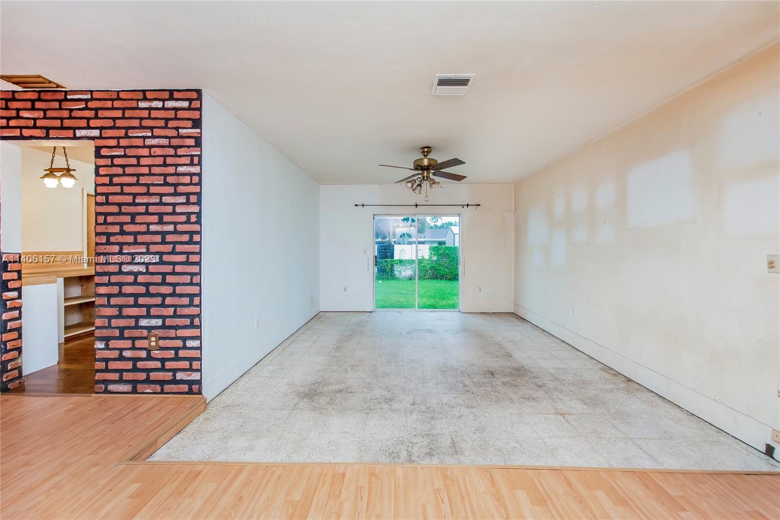 10391 Southwest 156th Street Miami, FL 33157 - Photo 10 of 33 a view of entryway with wooden floor