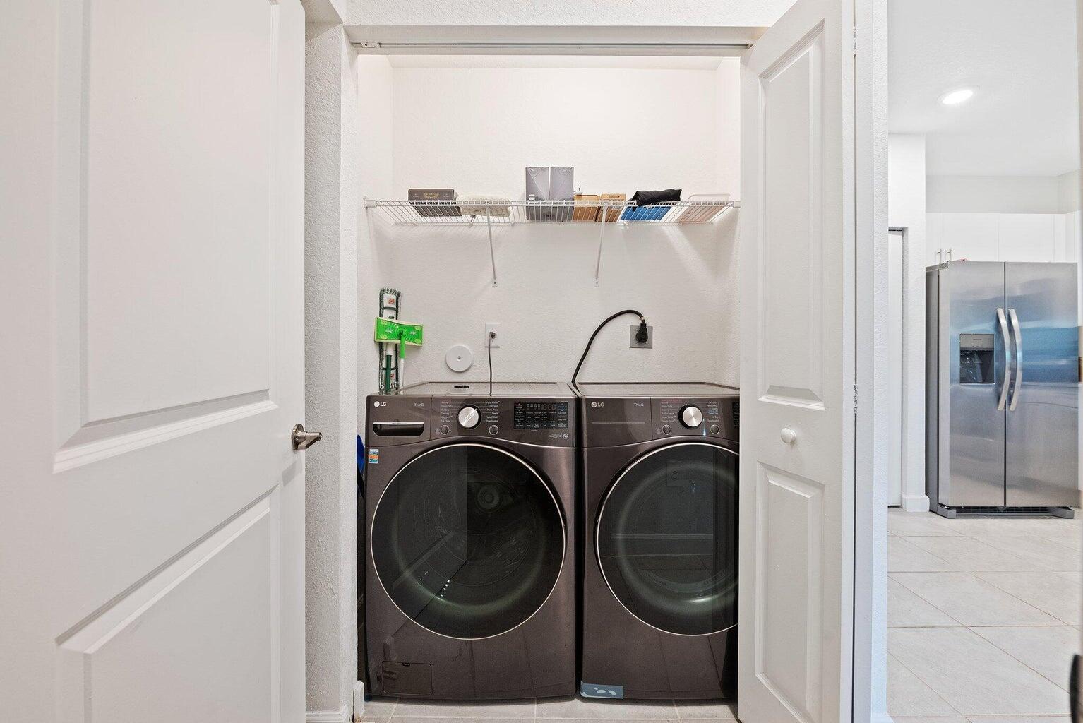 2701 Southeast 10th Street Homestead, FL 33035 - Photo 13 of 23 a view of a hallway with washer and dryer