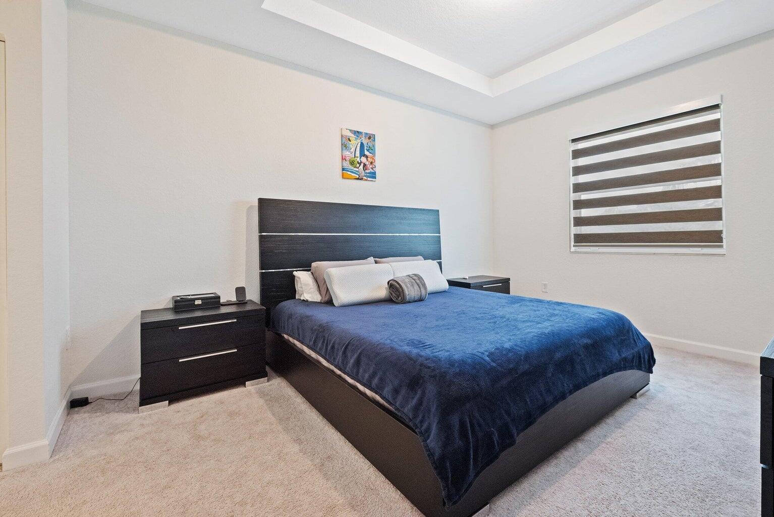 2701 Southeast 10th Street Homestead, FL 33035 - Photo 14 of 23 a bedroom with a bed and dresser
