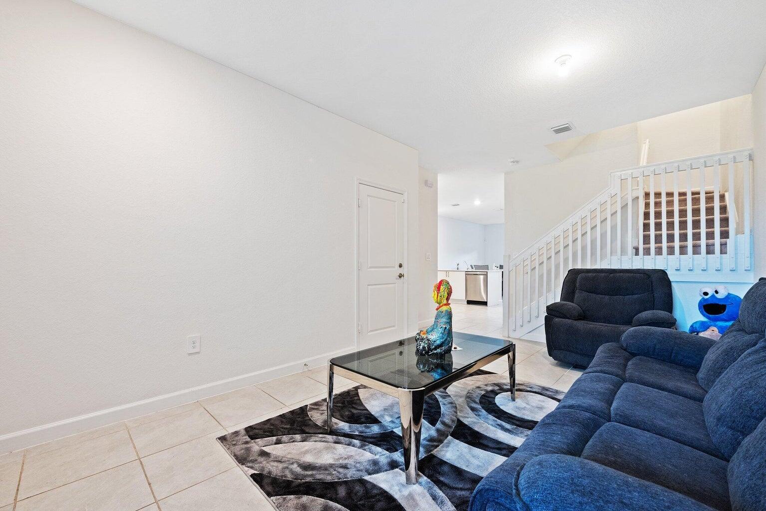 2701 Southeast 10th Street Homestead, FL 33035 - Photo 3 of 23 a living room with furniture and a window