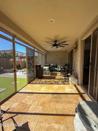 a view of swimming pool with seating area