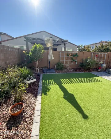 a view of a back yard of the house