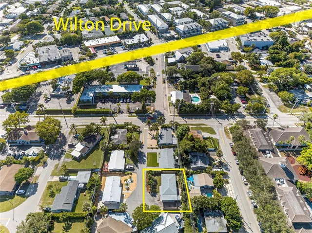 a view of swimming pool with outdoor seating space