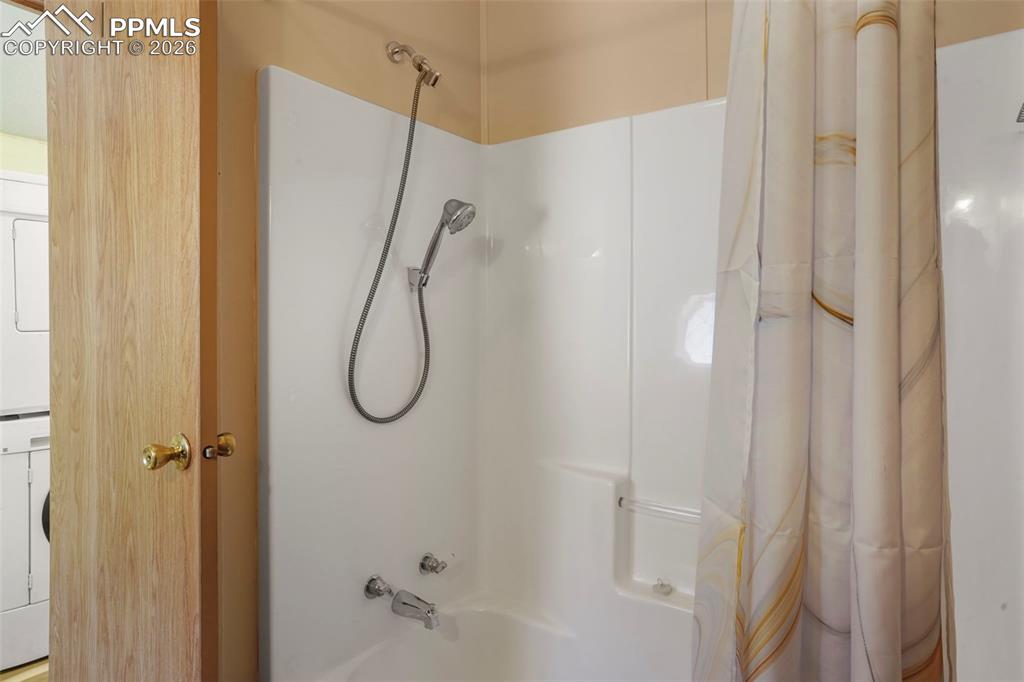2450 Pathfinder Road Florissant, CO 80816 - Photo 14 of 29 a bathroom with a glass shower door