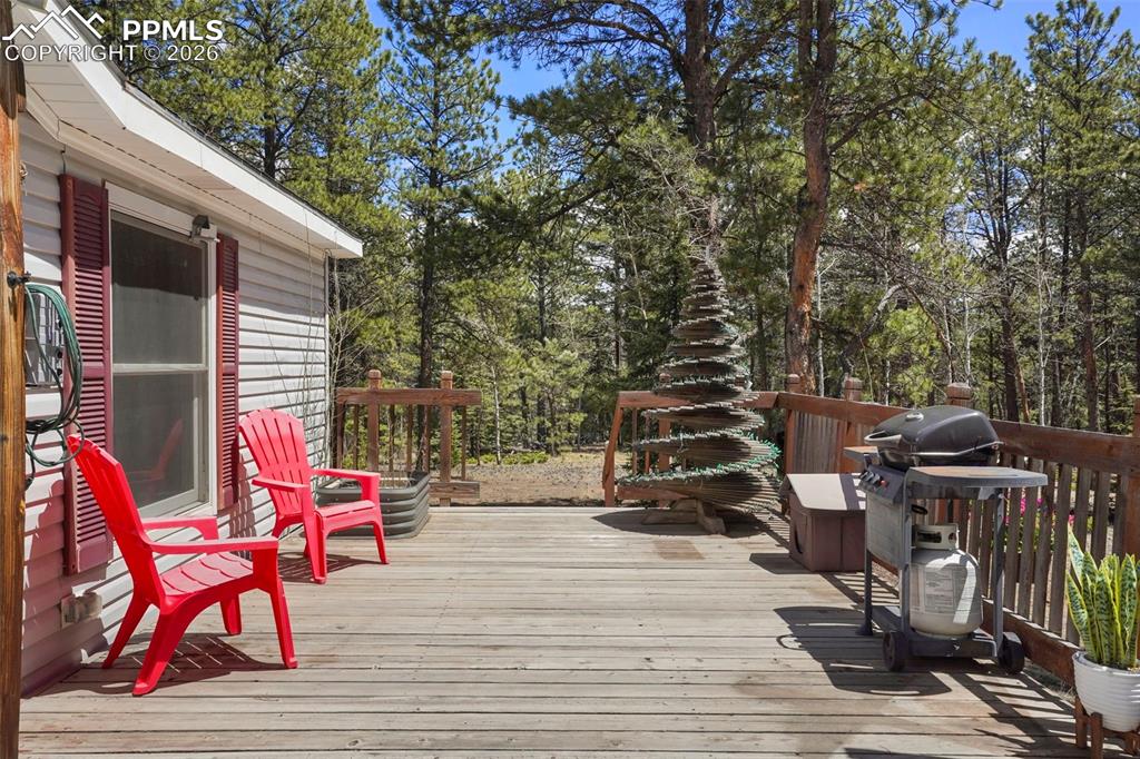 2450 Pathfinder Road Florissant, CO 80816 - Photo 2 of 29 a outdoor space with chairs