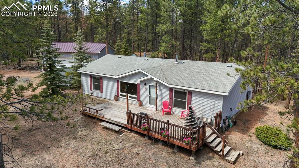 2450 Pathfinder Road Florissant, CO 80816 - Photo 24 of 29 an aerial view of a house