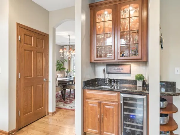 a kitchen with stainless steel appliances granite countertop a stove and a refrigerator