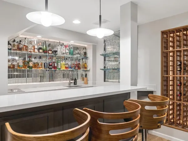a kitchen with a sink and a large window