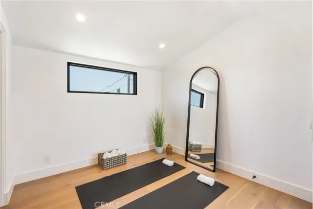 a view of living room with furniture and kitchen view