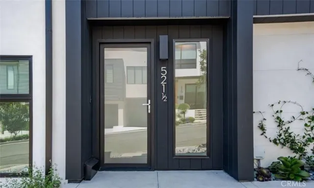 a kitchen with stainless steel appliances a sink stove and cabinets