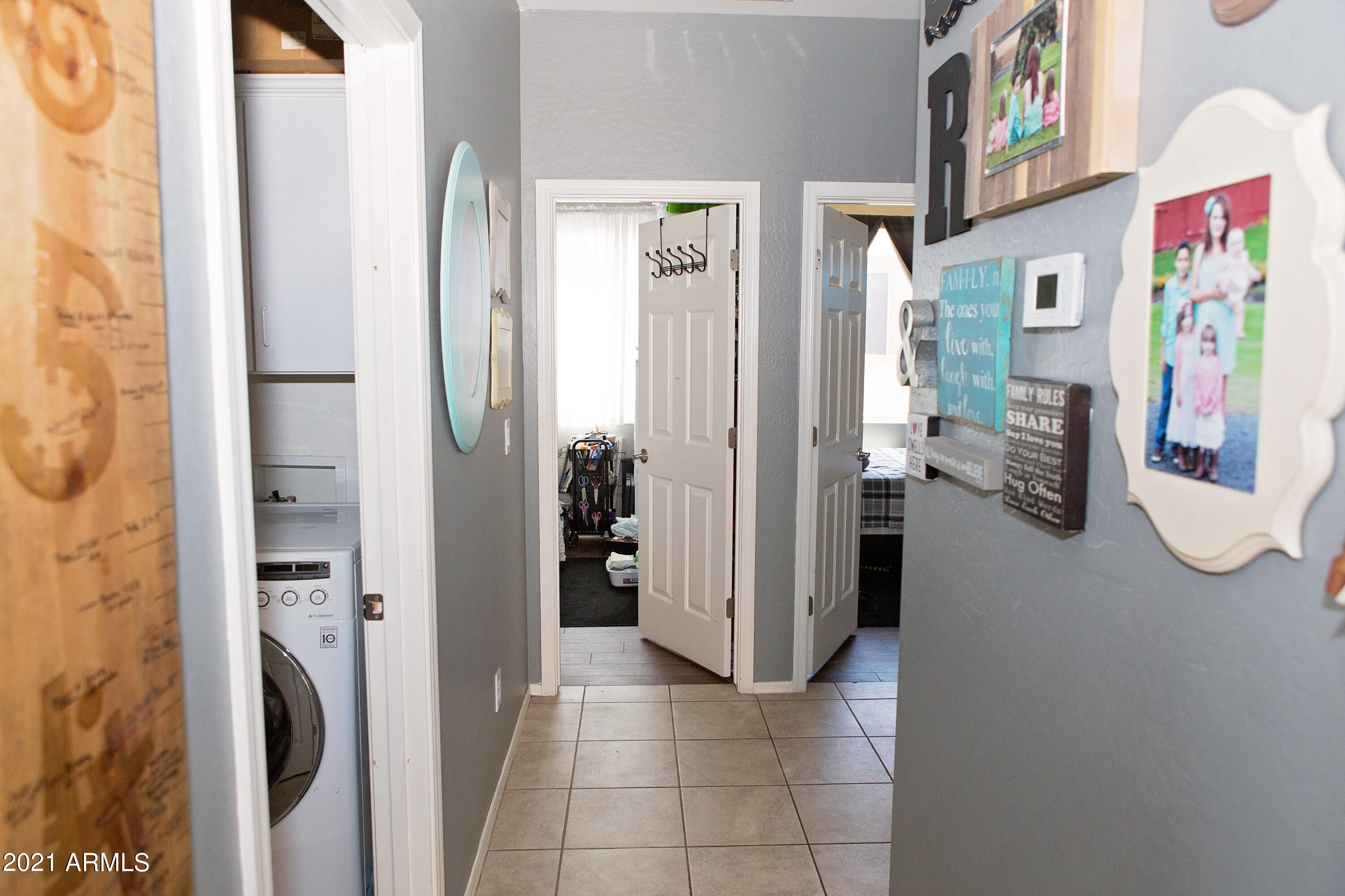 40808 North Raleigh Court Phoenix, AZ 85086 - Photo 12 of 20 Hallway to Bedrooms & Laundry