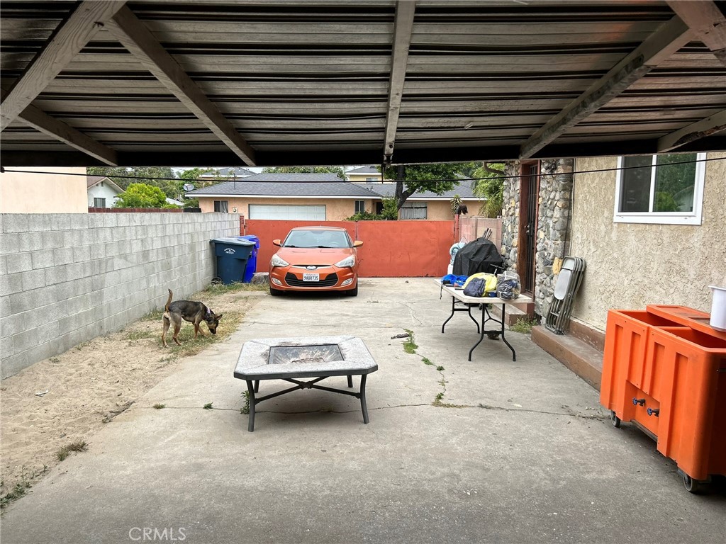 10205 Bryson Avenue South Gate, CA 90280 - Photo 30 of 35 a view of a chairs and table in patio