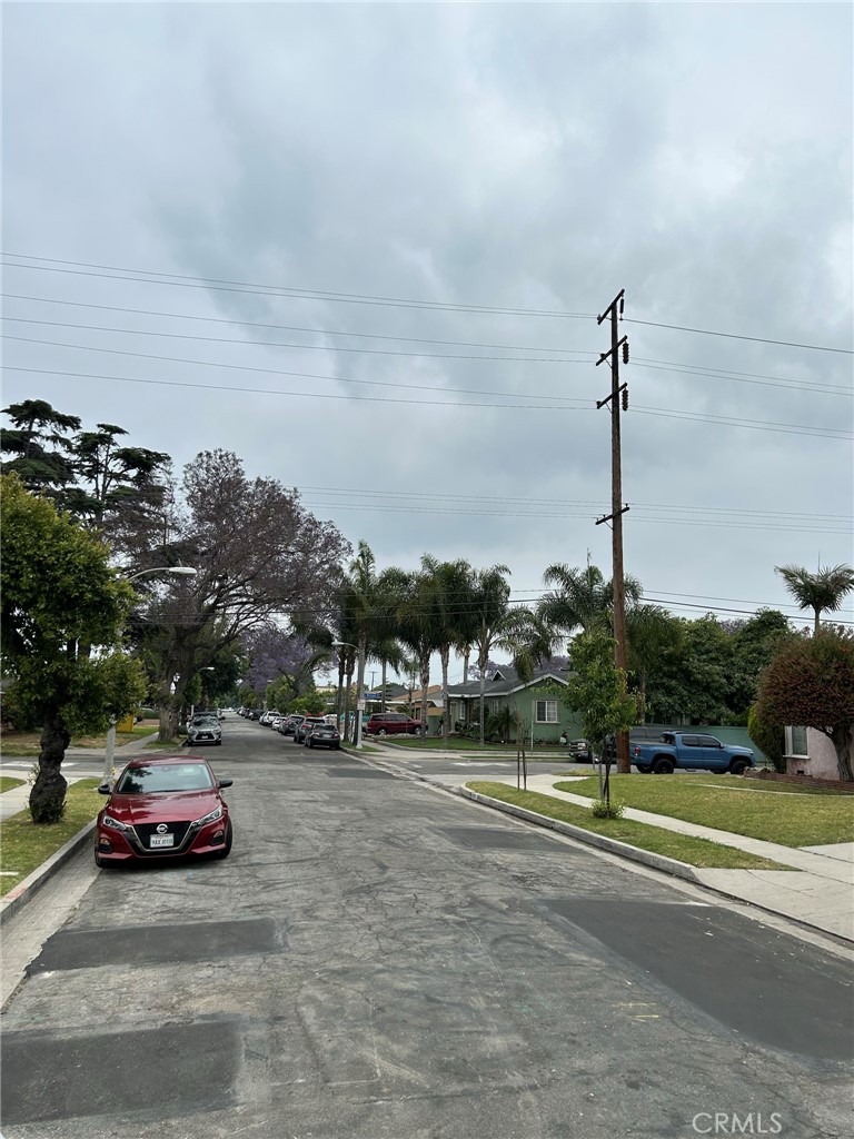 10205 Bryson Avenue South Gate, CA 90280 - Photo 7 of 35 a view of street with parked cars