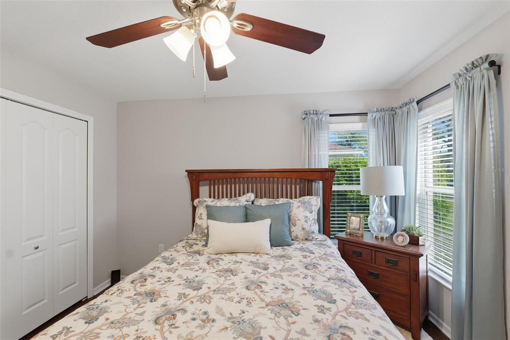 14126 Andrew Scott Road Spring Hill, FL 34609 - Photo 25 of 29 a bed room with a bed and a window