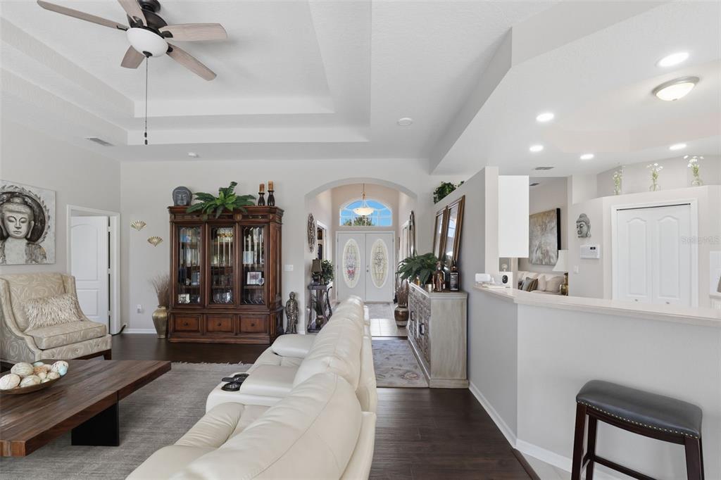 14126 Andrew Scott Road Spring Hill, FL 34609 - Photo 8 of 29 a living room with furniture and wooden floor