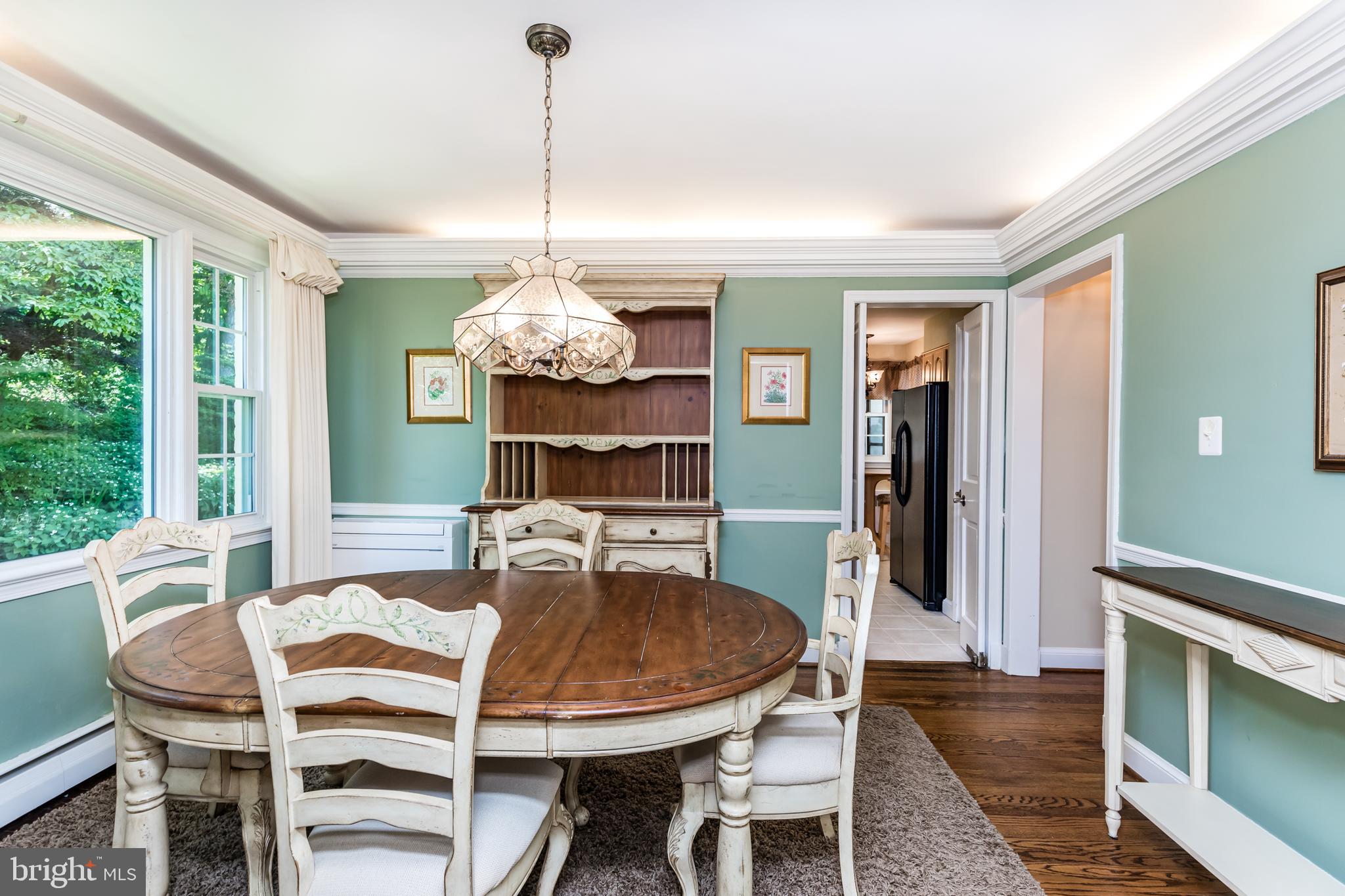 6901 Dorsey Road Laytonsville, MD 20882 - Photo 17 of 60 Formal dining with hardwood flooring & uplighting