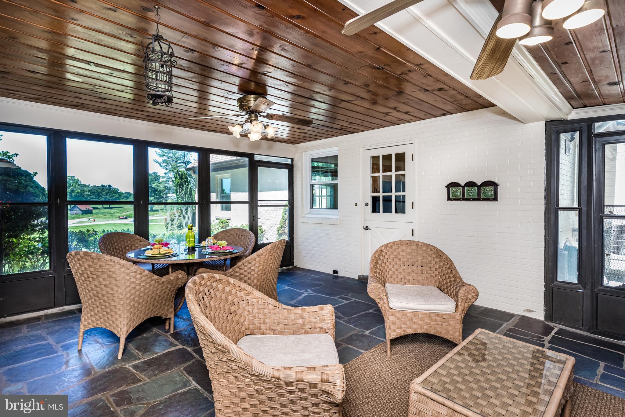 6901 Dorsey Road Laytonsville, MD 20882 - Photo 49 of 60 Screened in porch between garage and house