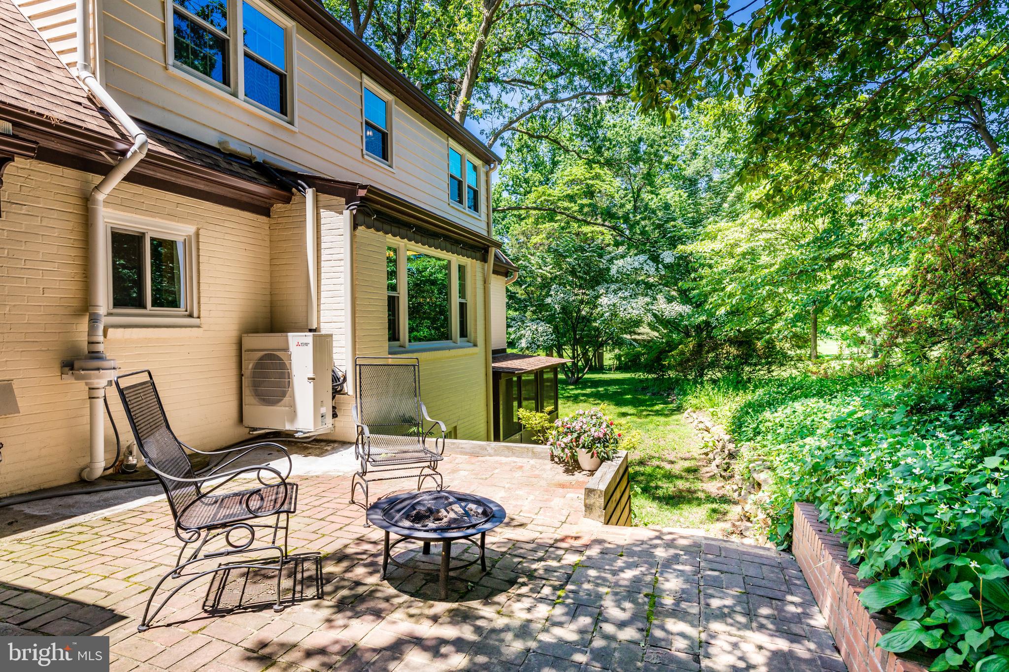 6901 Dorsey Road Laytonsville, MD 20882 - Photo 54 of 60 Rear brick patio with lush landscaping