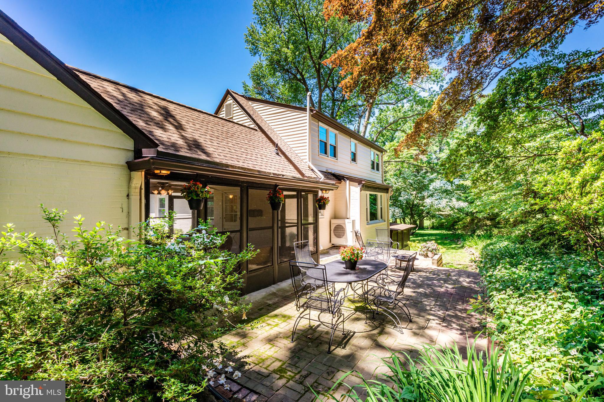 6901 Dorsey Road Laytonsville, MD 20882 - Photo 56 of 60 Rear brick patio with lush landscaping