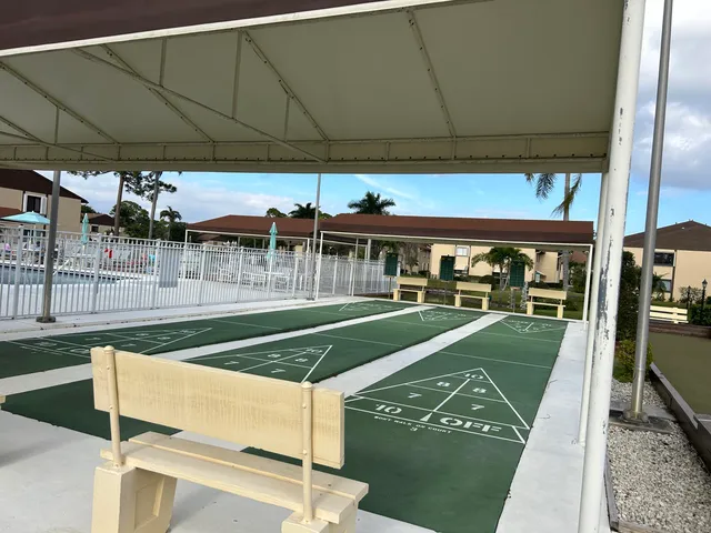 a view of a swimming pool with a patio