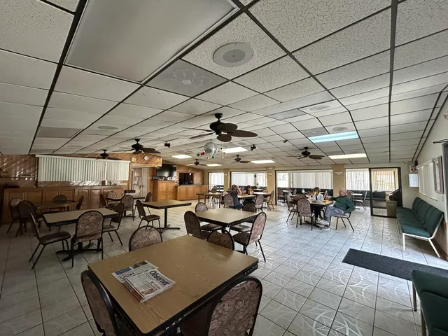 a living room with lots of furniture and white walls