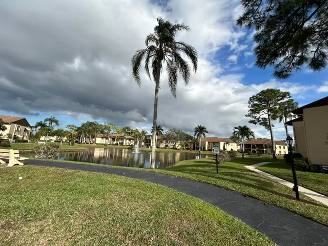a view of a golf course with a fountain