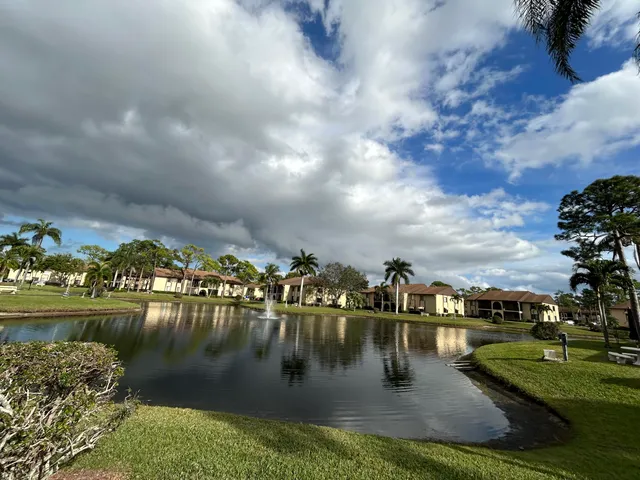 a view of residential houses with outdoor space