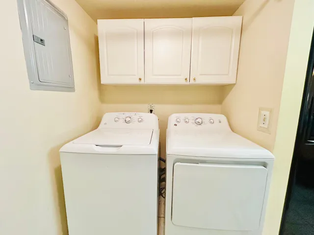 a utility room with dryer and washer