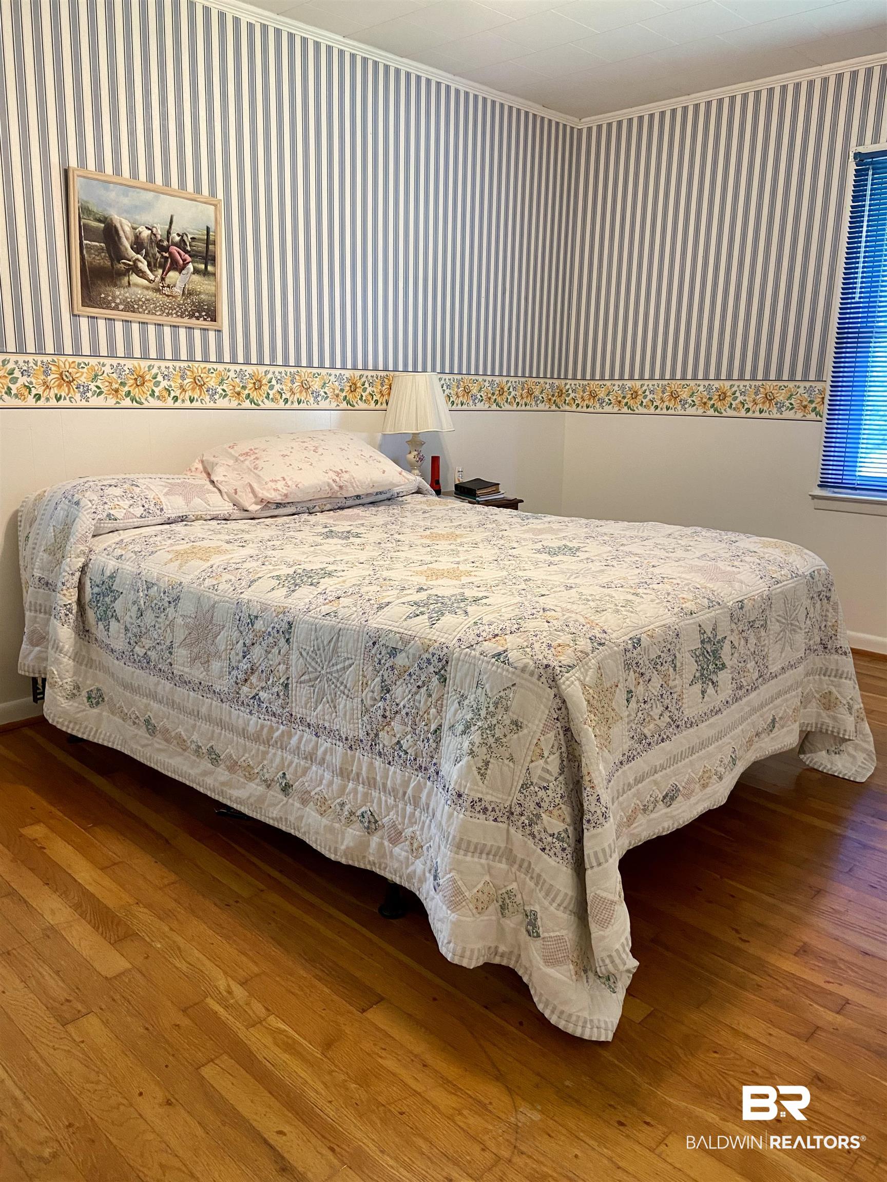 102 Ashley Street Evergreen, AL 36401 - Photo 12 of 26 Bedroom with hardwood / wood-style flooring