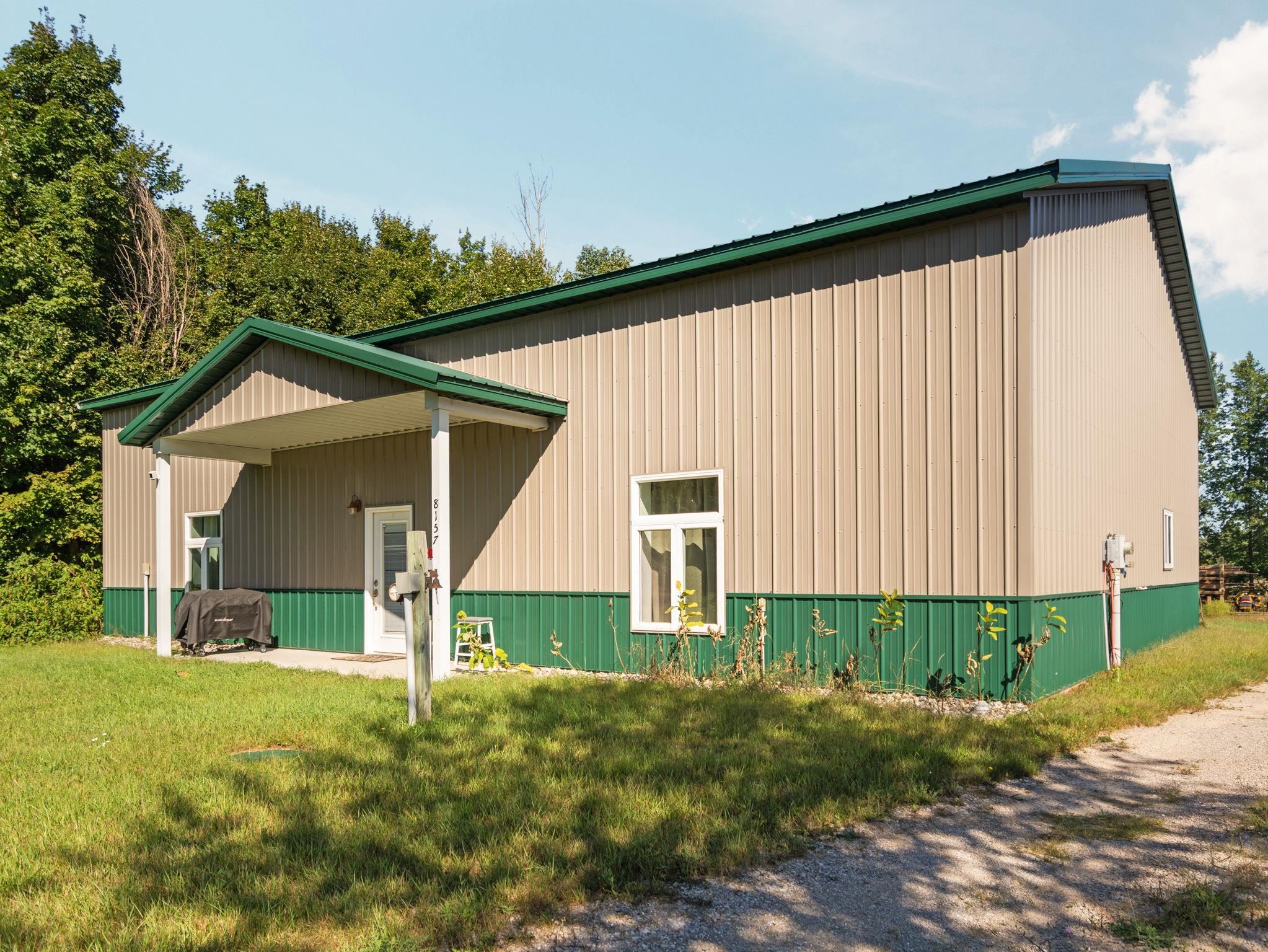 8157 Crisp Road Williamsburg, MI 49690 - Photo 1 of 33 1951102-b70387fa-8870-4fca-806f-000f084d5070.JPG