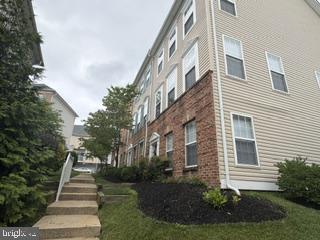 538 Rhapsody Court, Unit 538 Cockeysville, MD 21030 - Photo 4 of 30 Charming townhouse with lush greenery.