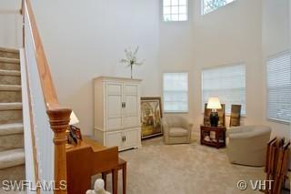 12643 Biscayne Court Naples, FL 34105 - Photo 2 of 8 a living room with furniture