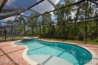 12643 Biscayne Court Naples, FL 34105 - Photo 8 of 8 a view of a backyard