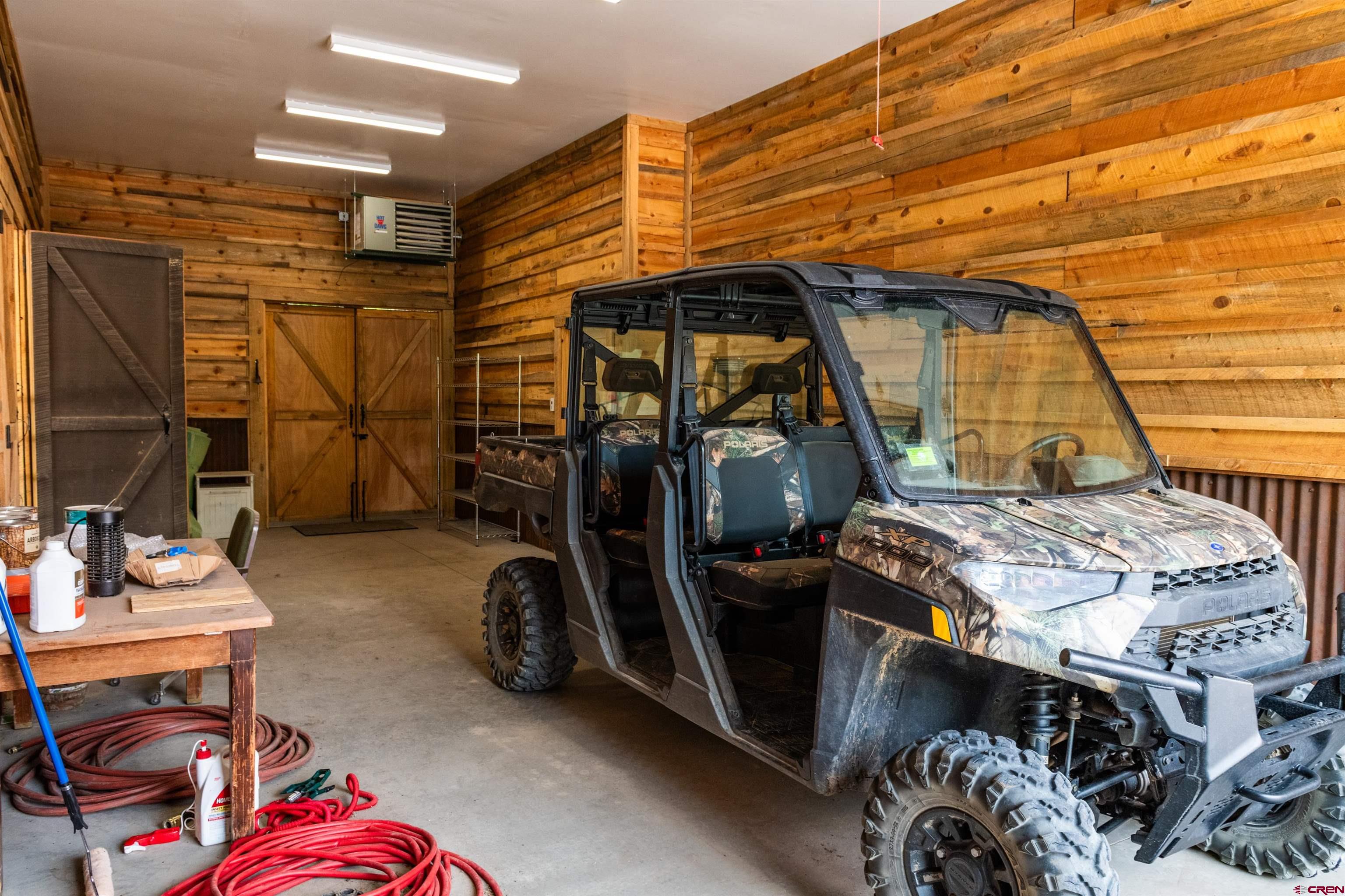 6590 Road 46 Mancos, CO 81328 - Photo 32 of 35 a room with storage and utility